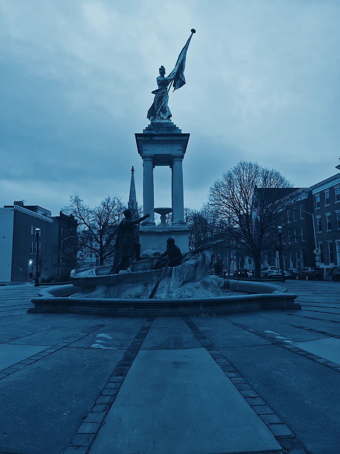 The Francis Scott Key monument fountain on a Baltimore plaza, rendered in deep blue