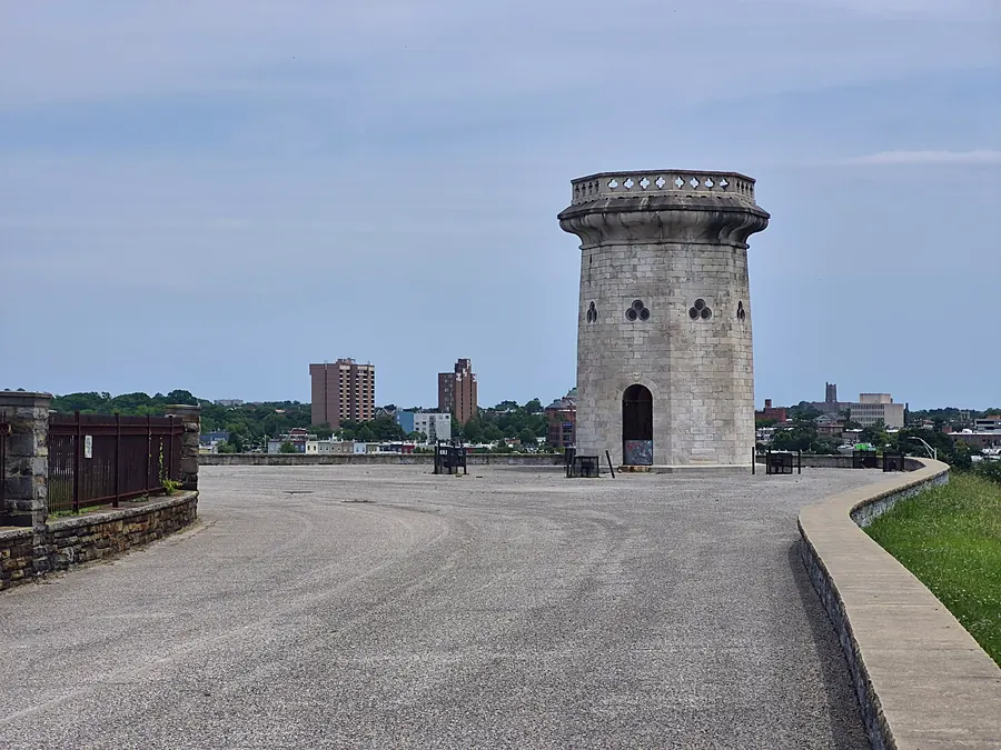 Historic masonry and open ground overlooking the city.