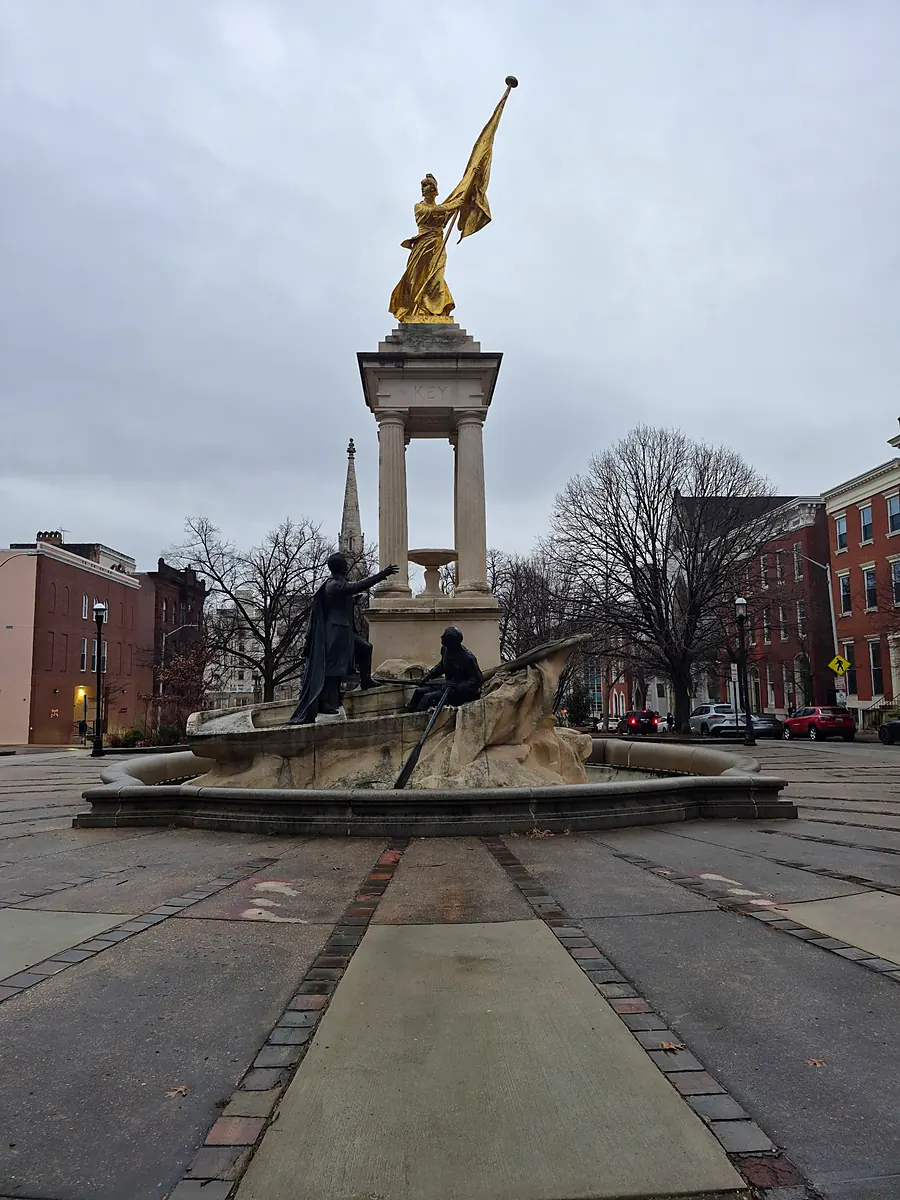 Public squares where neighbors gather, marked by weather and time.