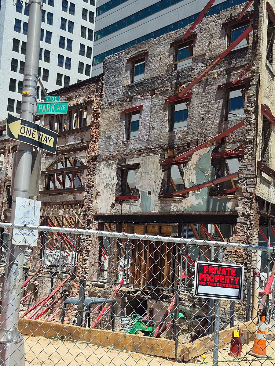 Facades and steps mid-repair, where care is most visible.